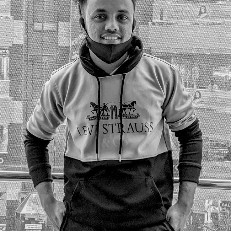 Portrait of Nova, group coordinator and fusion cooking expert